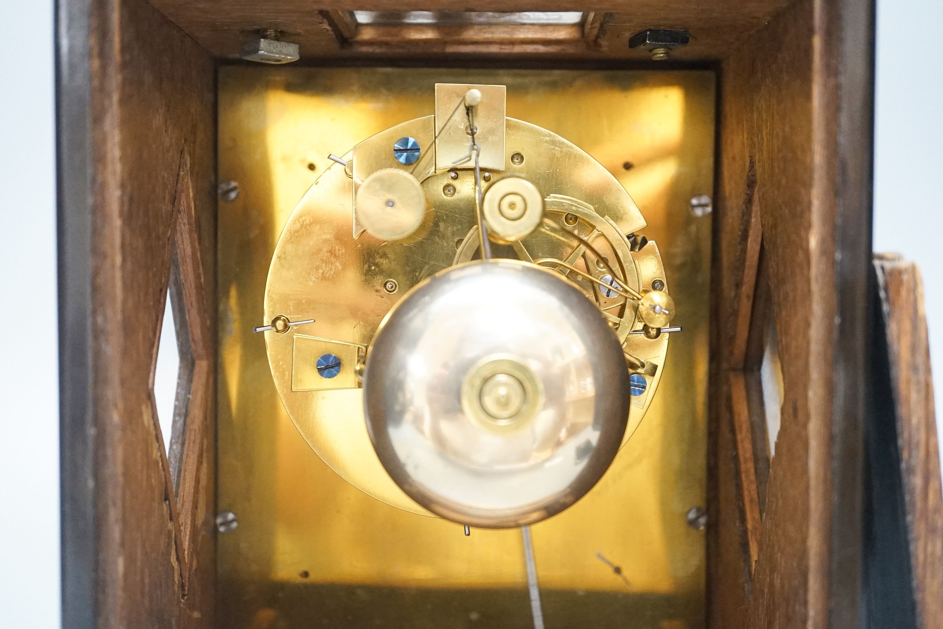 A 19th century French mahogany cased mantel clock, key and pendulum